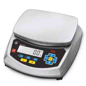 Digital scale with a flat weighing platform and a display showing weight measurements.